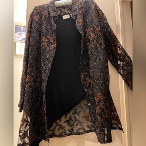 Downward slanted black top with jacket